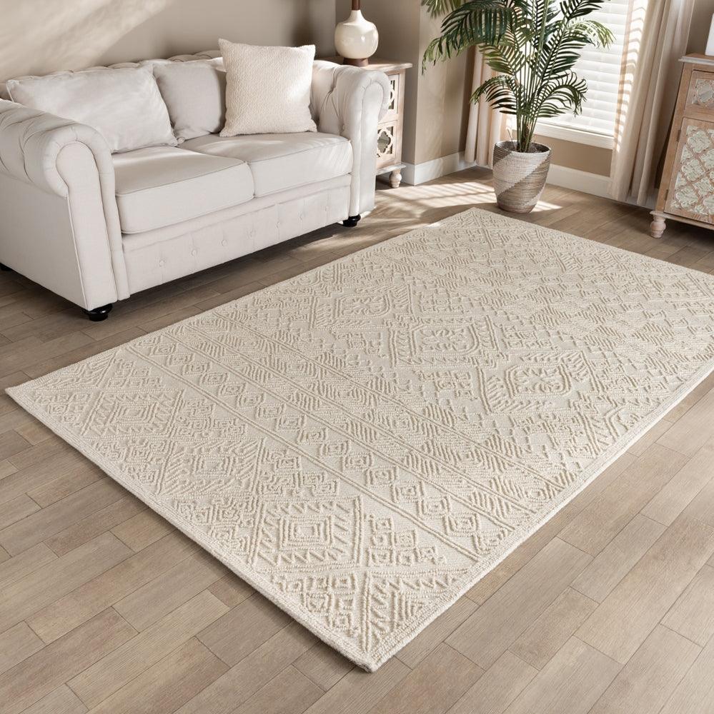 BAXTON STUDIO LINWOOD MODERN AND CONTEMPORARY IVORY HAND-TUFTED WOOL AREA RUG