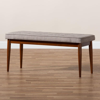 BAXTON STUDIO ITAMI MID-CENTURY MODERN LIGHT GREY FABRIC UPHOLSTERED MEDIUM OAK FINISHED WOOD DINING BENCH